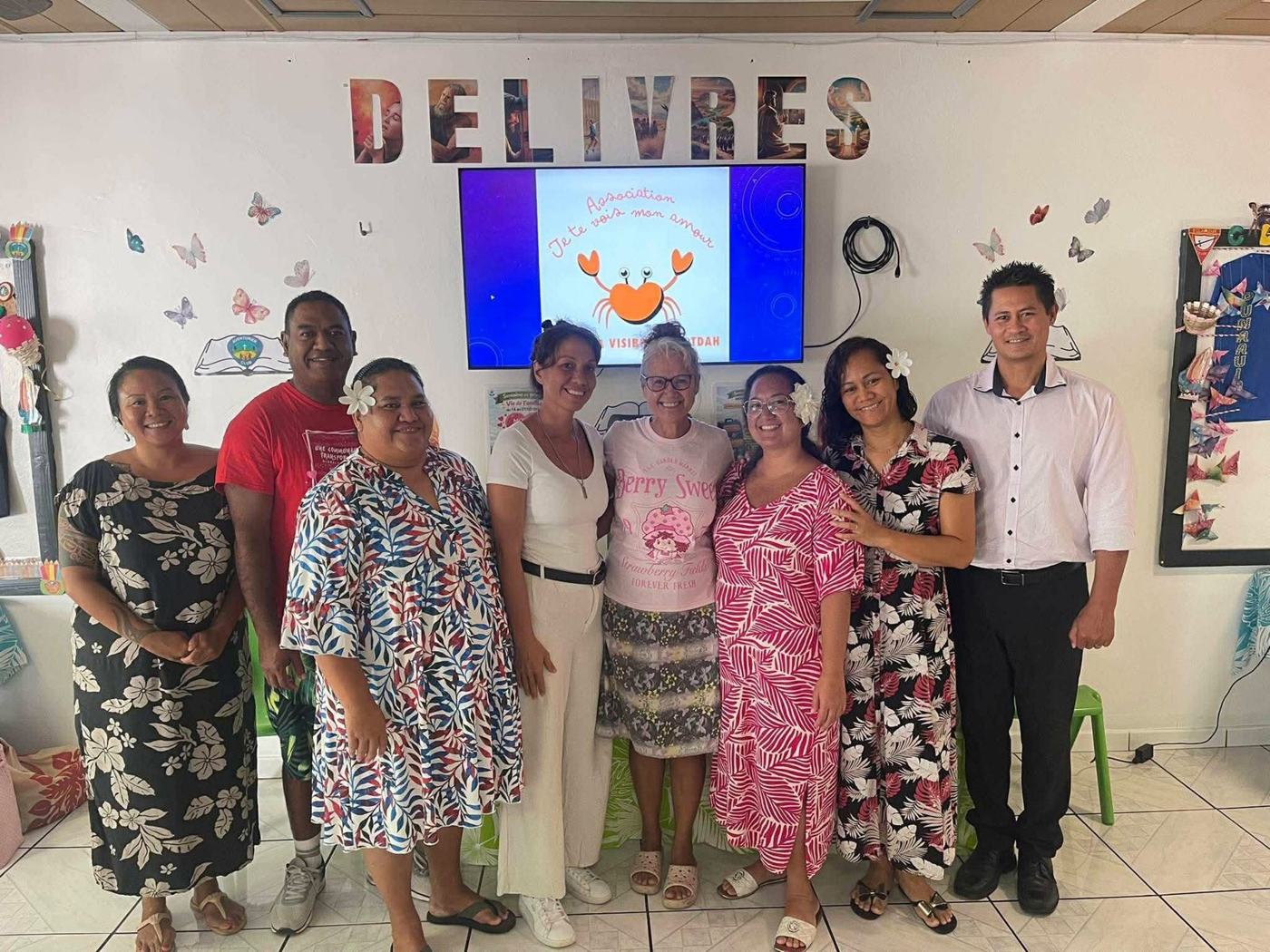 Participants de l'atelier TDAH devant l'écran au logo de l'association