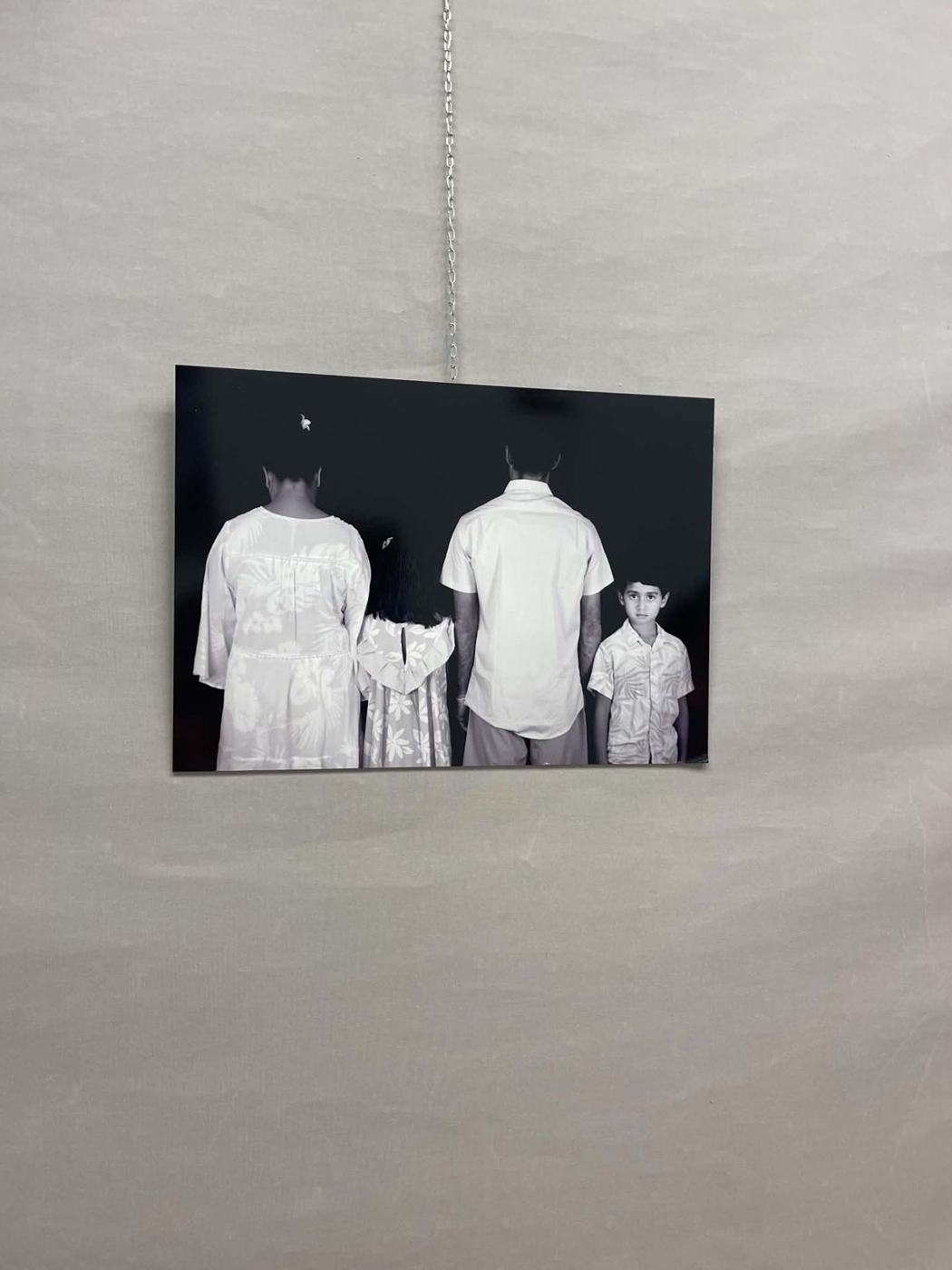 Portrait d'une famille photographiée de dos